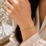 دستبند نقره زنانه طرح رشته‌ای طلایی مدل DEF K32 - Image 2